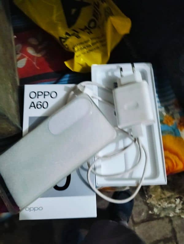 oppo a60   8/128 box with charger 2