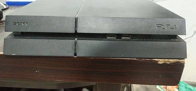 PS4 console with 2 controllers 12