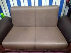 two seater sofa cum bed with inner draws