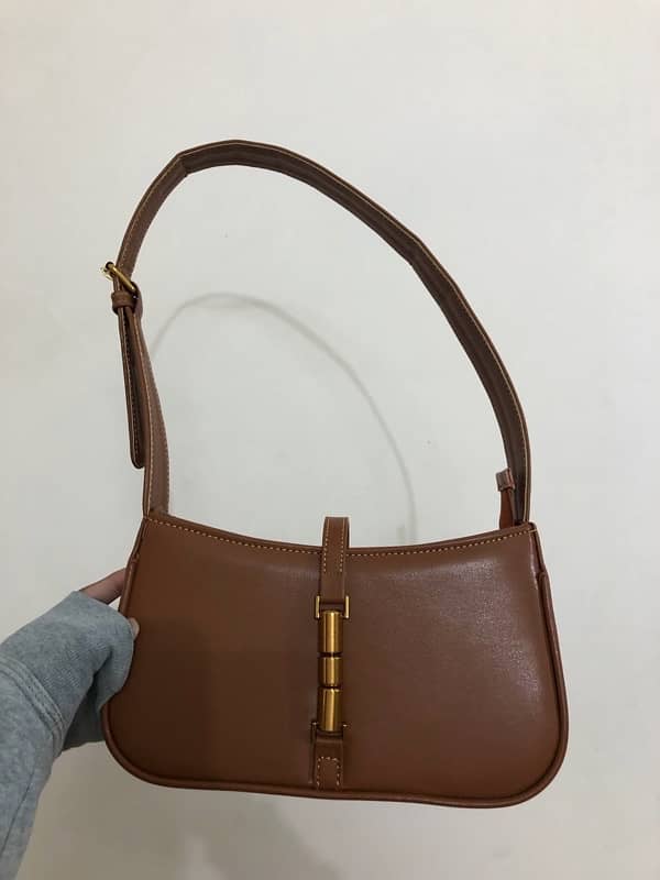 Brown leather bag from “Manchali” 0