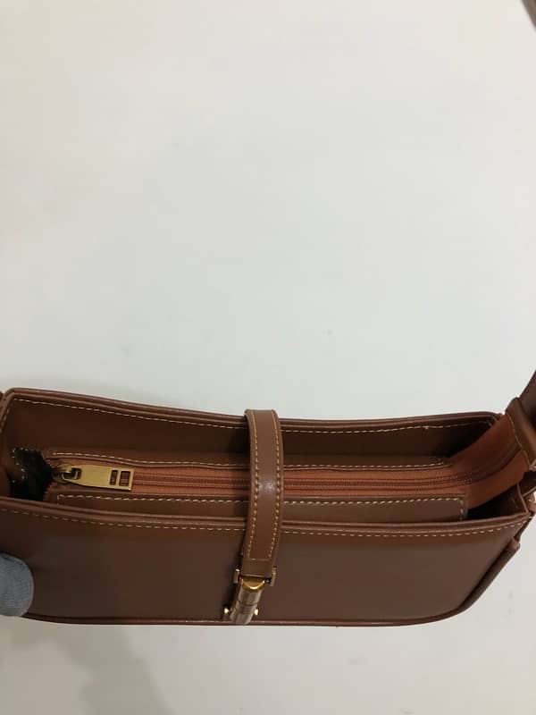 Brown leather bag from “Manchali” 2