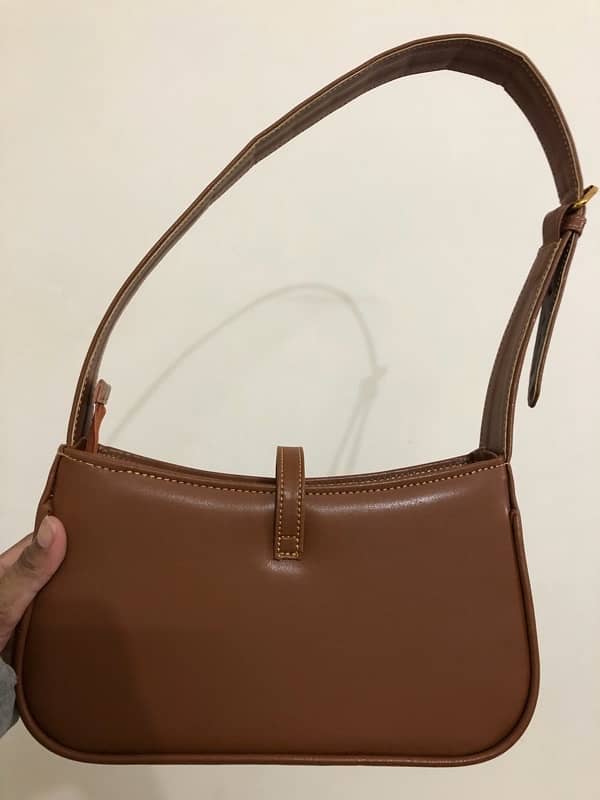 Brown leather bag from “Manchali” 3