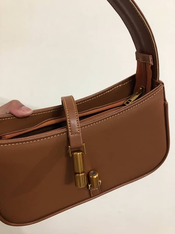 Brown leather bag from “Manchali” 6