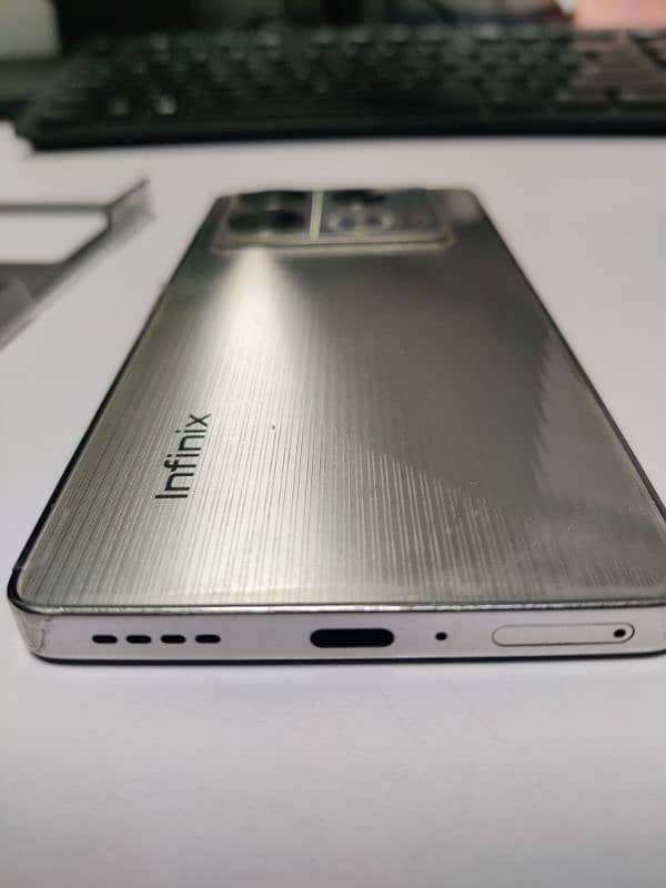 Infinix note 40 racing edition 10 month warranty 4