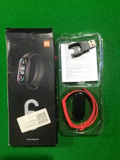 M6 Smart band with complete box and accessories.