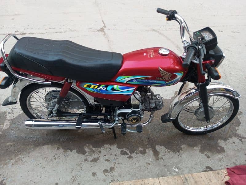 Honda 70 red colour for sale 1