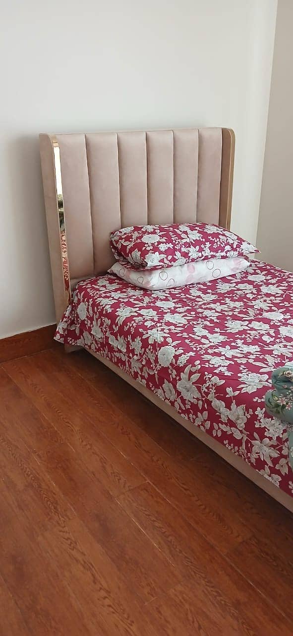 2 single beds with drawers(used for one week only) 1