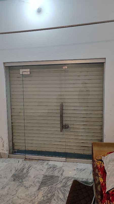 Glass door 7*7 size and iron shutter same size for sale 1