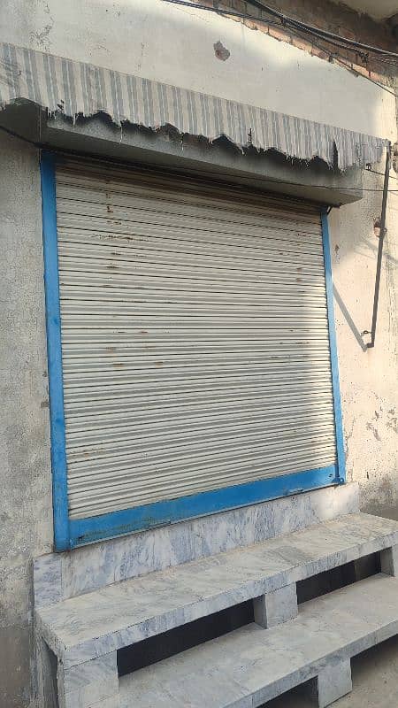 Glass door 7*7 size and iron shutter same size for sale 2