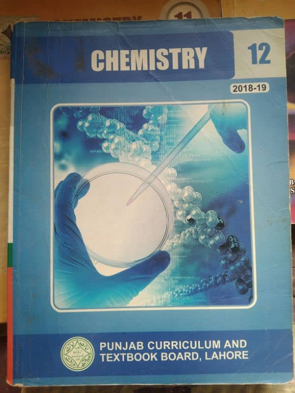 Chemistry book and guide of 11t,12th grade of Punjab textbook board. 0