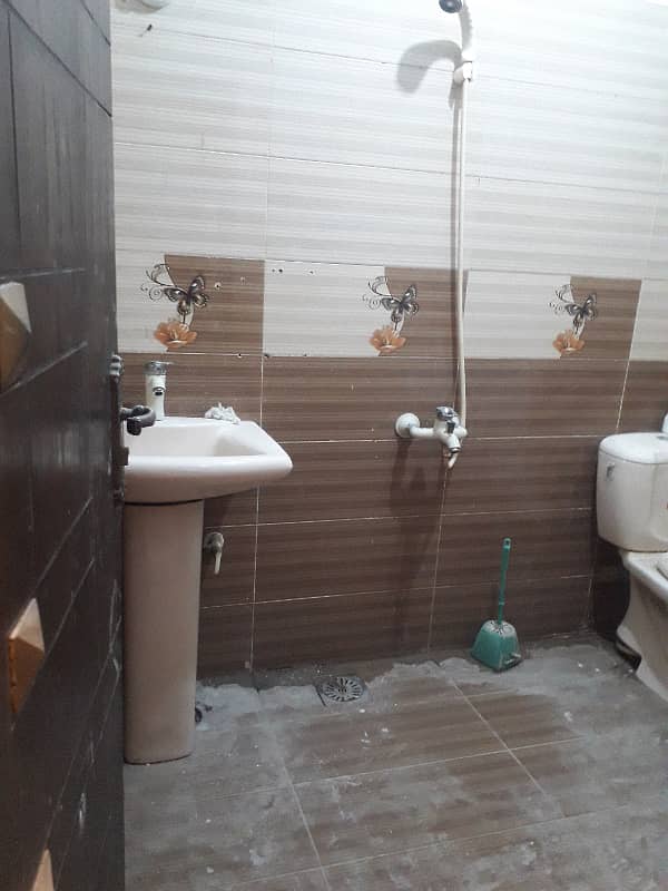 tiled flooring three bed dd portion for rent in johar 6