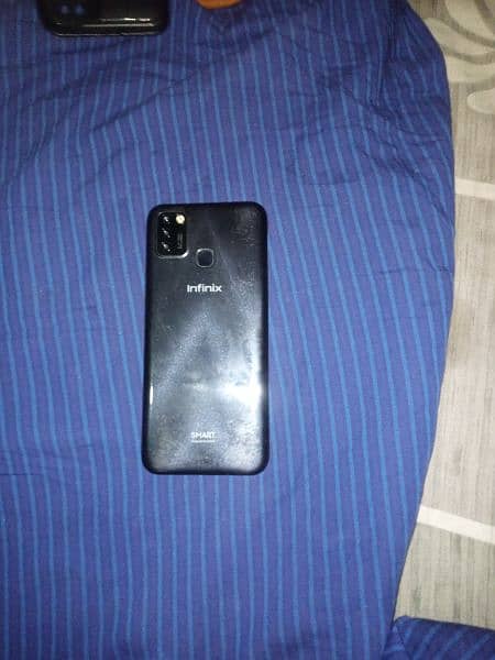 infinix smart 5 3 64 with charger no open repair 7