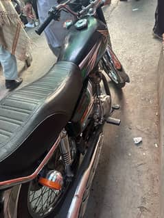 Honda 125 good condition first owner triple number