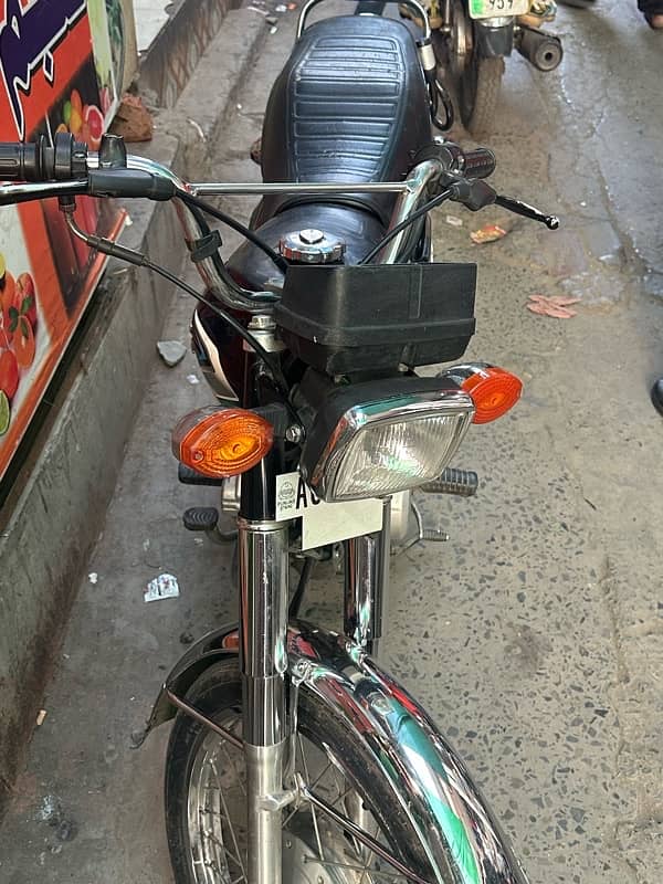 Honda 125 good condition first owner triple number 1