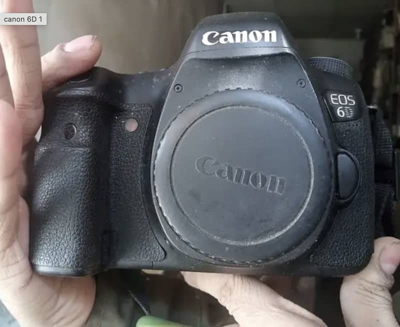 Canon 6d + 50 lens + battery charger 1