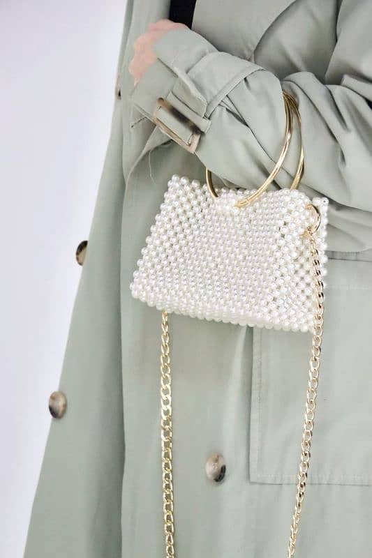 Elegant Pearl-Beaded Handbag with Gold Chain and Handle 1