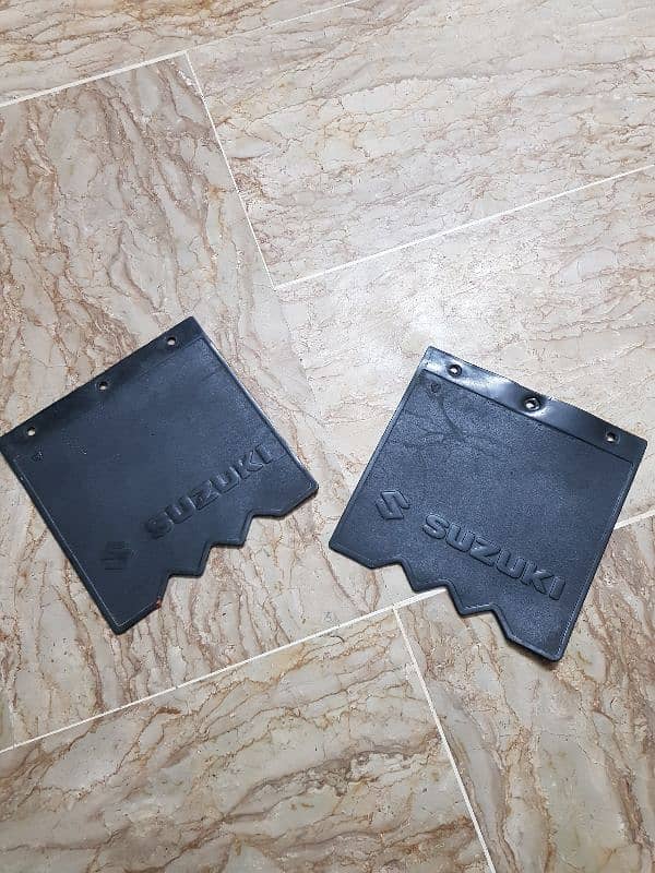 Suzuki Bolan/Ravi original mudflaps in used and genuine condition 0