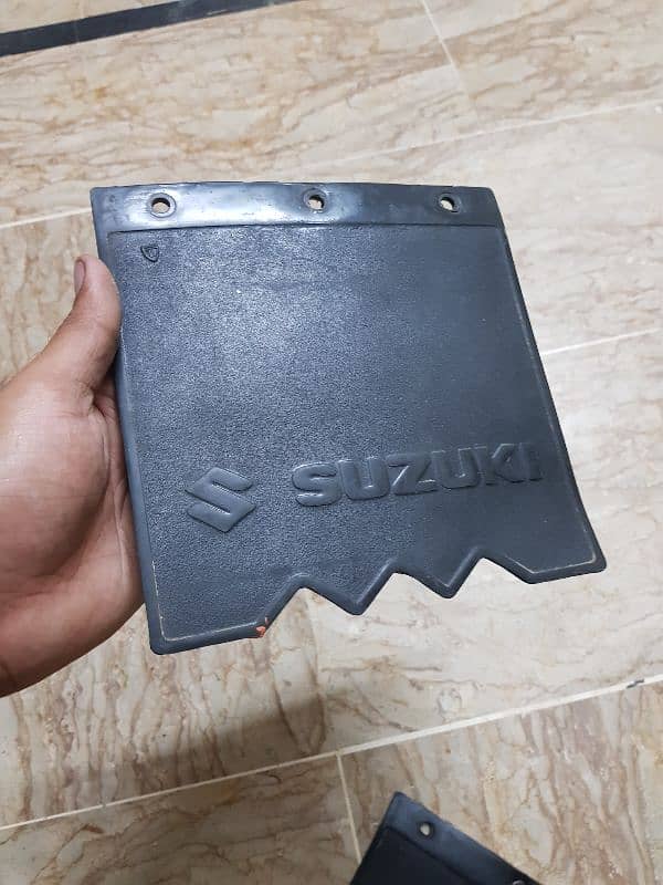 Suzuki Bolan/Ravi original mudflaps in used and genuine condition 5