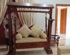 wooden baby cot and wooden swing