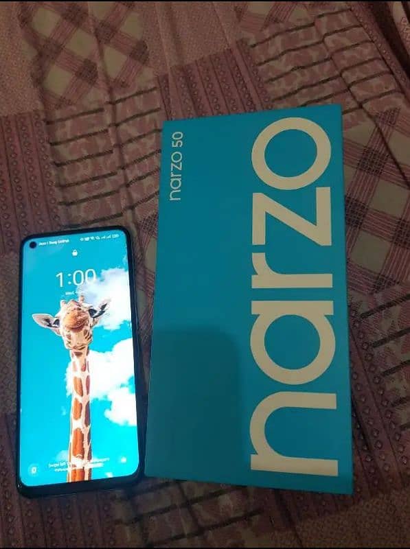 Realme narzo 50 with box and charger 1