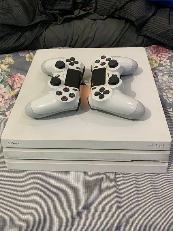 PS4 pro 1tb with 2 controller 1