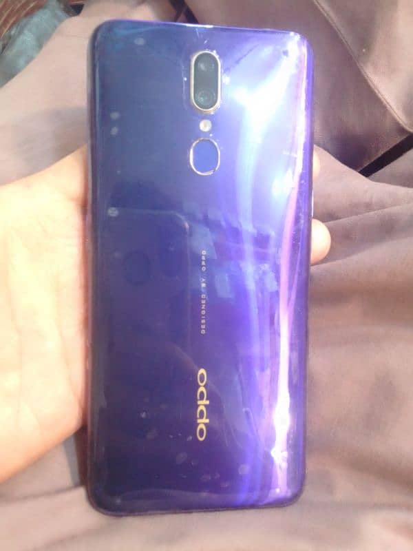 oppo f11 PTA official approve hai 4rm GB 64 panel mein white only kit 1