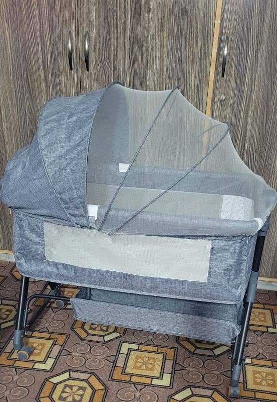 baby portable cot new condition 0