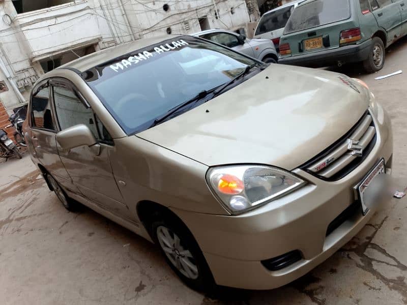 Suzuki Liana Model 2006 GOLDEN COLOR Good Condition Fully Loaded Car 1