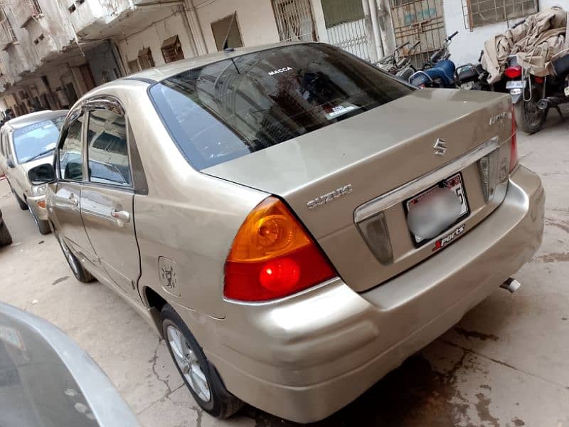 Suzuki Liana Model 2006 GOLDEN COLOR Good Condition Fully Loaded Car 4