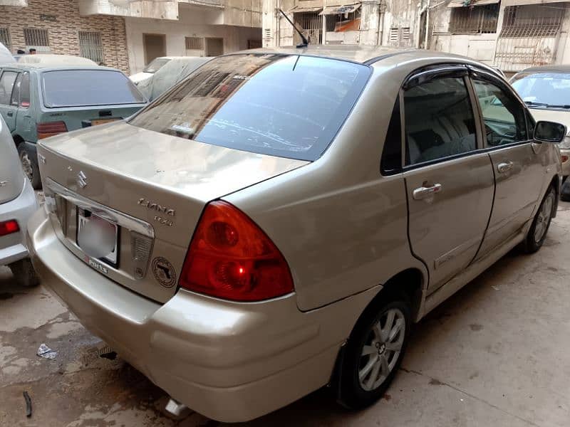 Suzuki Liana Model 2006 GOLDEN COLOR Good Condition Fully Loaded Car 10