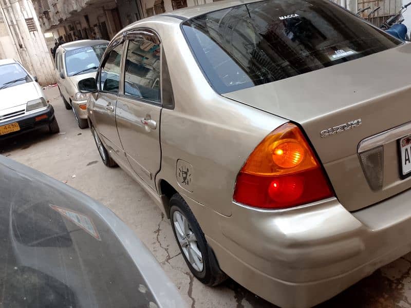 Suzuki Liana Model 2006 GOLDEN COLOR Good Condition Fully Loaded Car 11