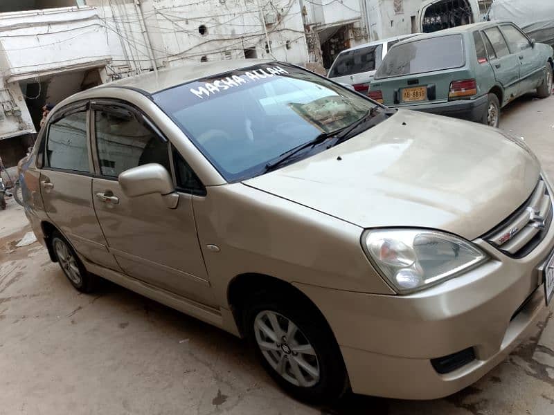 Suzuki Liana Model 2006 GOLDEN COLOR Good Condition Fully Loaded Car 12