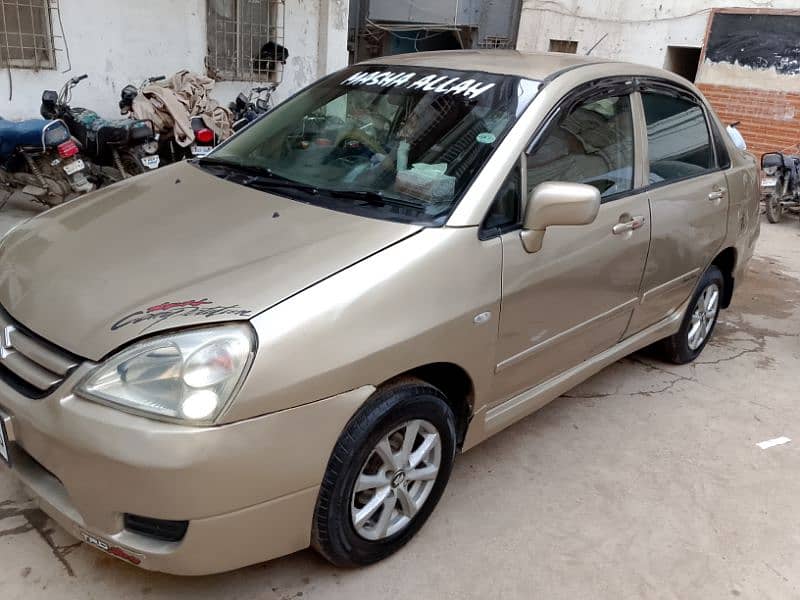 Suzuki Liana Model 2006 GOLDEN COLOR Good Condition Fully Loaded Car 13