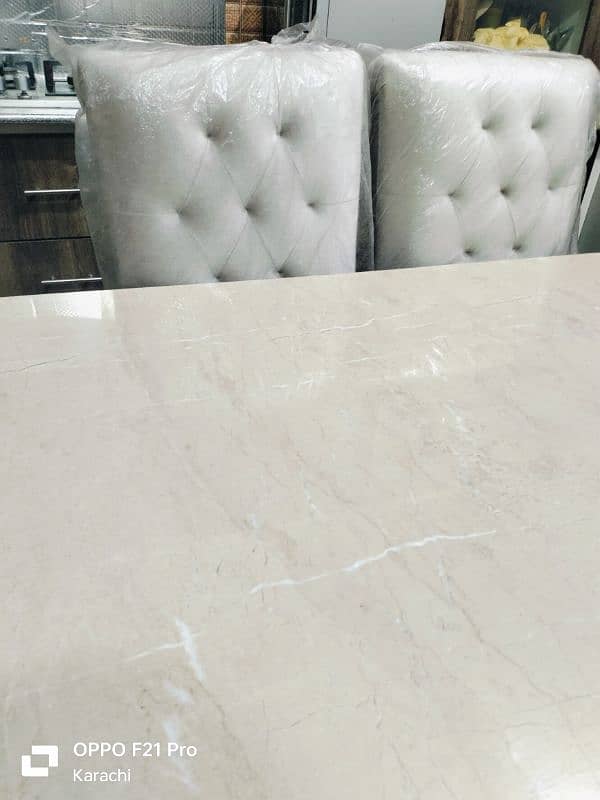 new dining marble  table and  gray velvet chair's 0