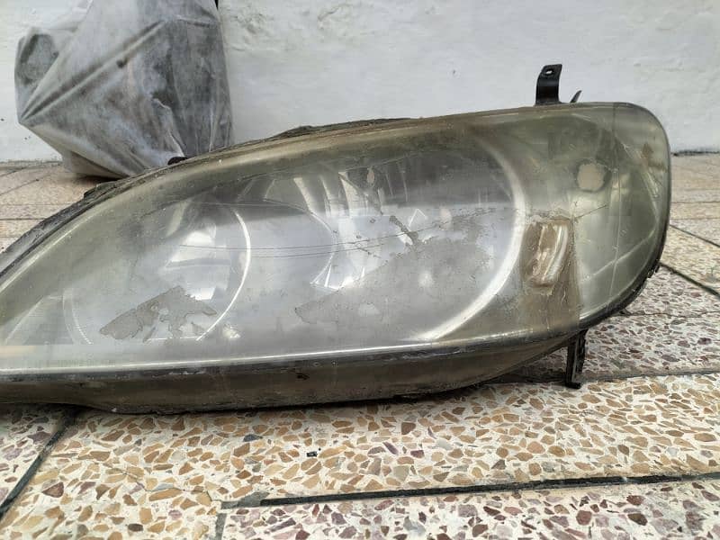 Honda civic 94 interior part and 2004 Honda civic headlights 12