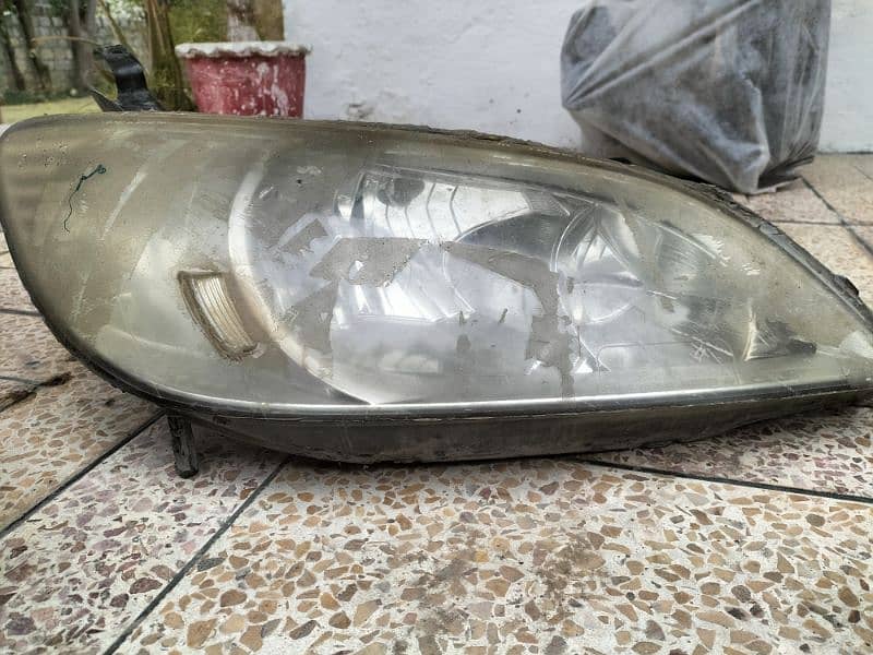 Honda civic 94 interior part and 2004 Honda civic headlights 13