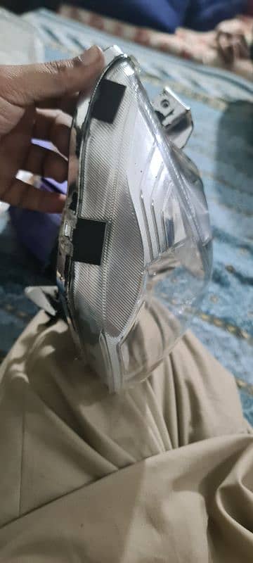 Suzuki GR150 genuine headlight crystal clear glass 4