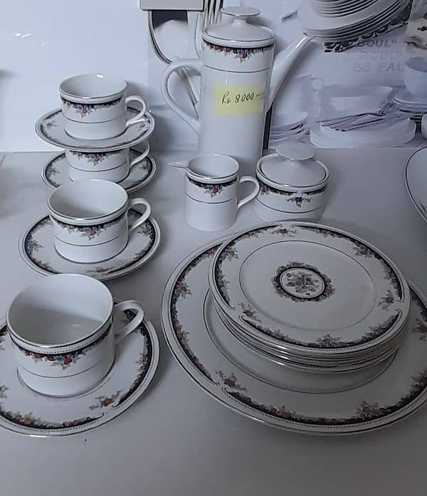 Tea set serving 4 person very less price. Little bit used 1