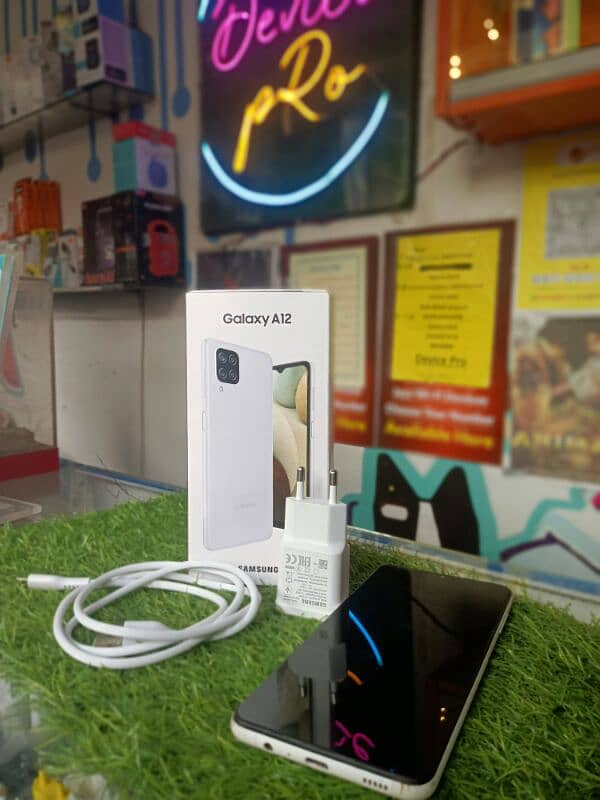 SAMSUNG A12 4/64 with box and charger 3