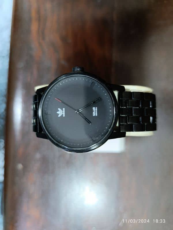 Original Adidas Black PVD plates Solar powered watch in 15000 only. 13