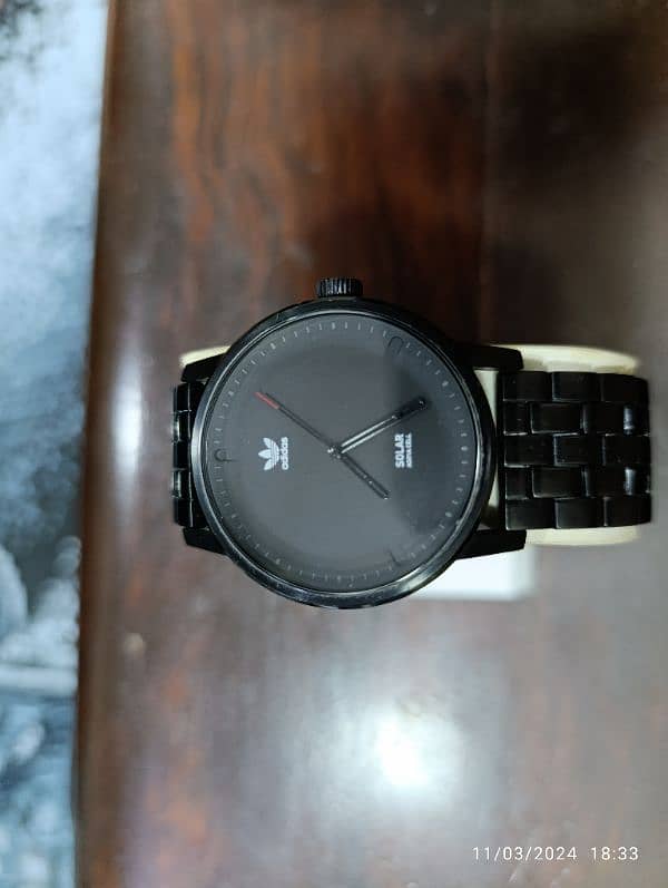 Original Adidas Black PVD plates Solar powered watch in 15000 only. 14