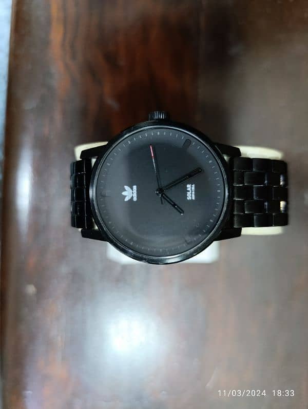 Original Adidas Black PVD plates Solar powered watch in 15000 only. 15