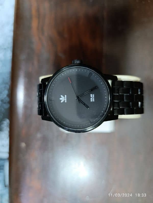 Original Adidas Black PVD plates Solar powered watch in 15000 only. 16