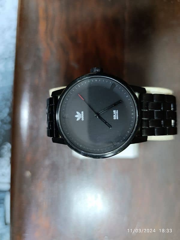 Original Adidas Black PVD plates Solar powered watch in 15000 only. 17