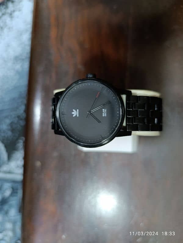 Original Adidas Black PVD plates Solar powered watch in 15000 only. 19