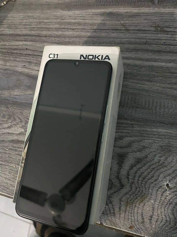 nokia c31 4/64 new condition. . . 11