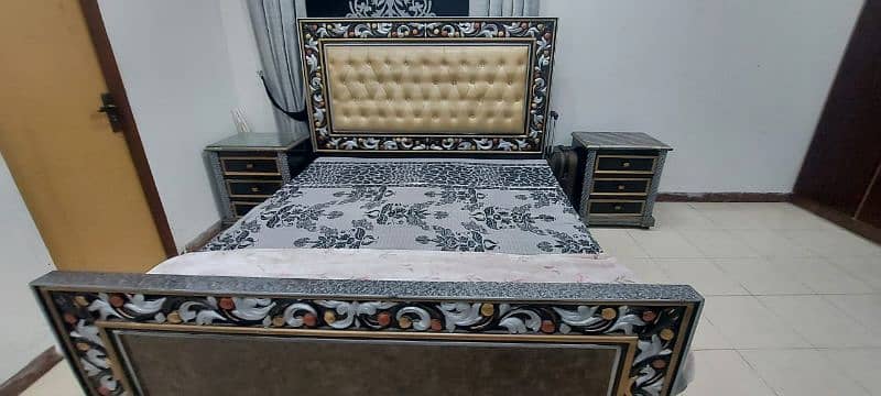 wooden bed set with two side tables 0