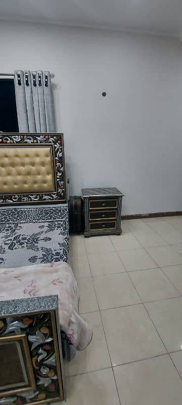 wooden bed set with two side tables 11