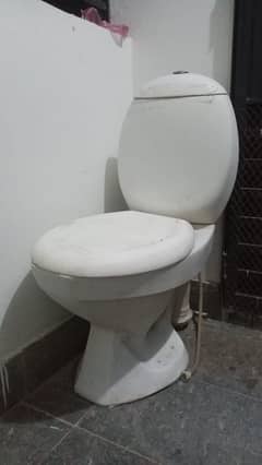 slightly used commode for sell white colour