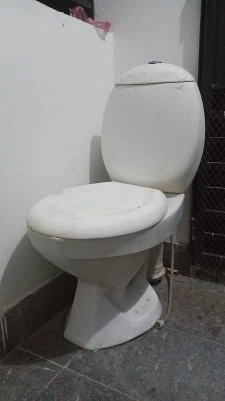 slightly used commode for sell white colour 0